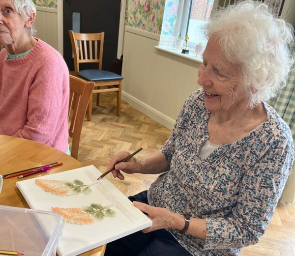 old sarum manor resident sat down painting